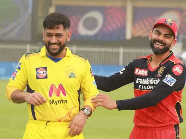 CSK skipper MS Dhoni and RCB's star batter Virat Kohli sharing a light moment.