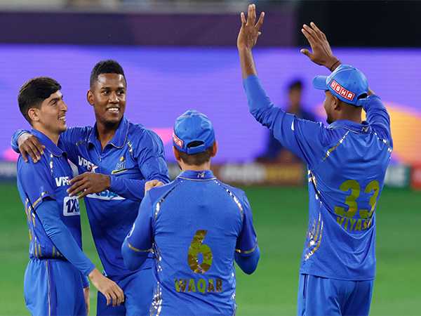 MI Emirates' Akeal Hosein celebrating after taking wicket against Gulf Giants during second season of ILT20 (Image: ILT20)